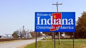 Welcome to Indiana sign on highway.