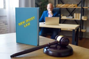 NEW JERSEY LAW inscription on the book. New Jersey residents are subject to New Jersey state and U.S. federal laws