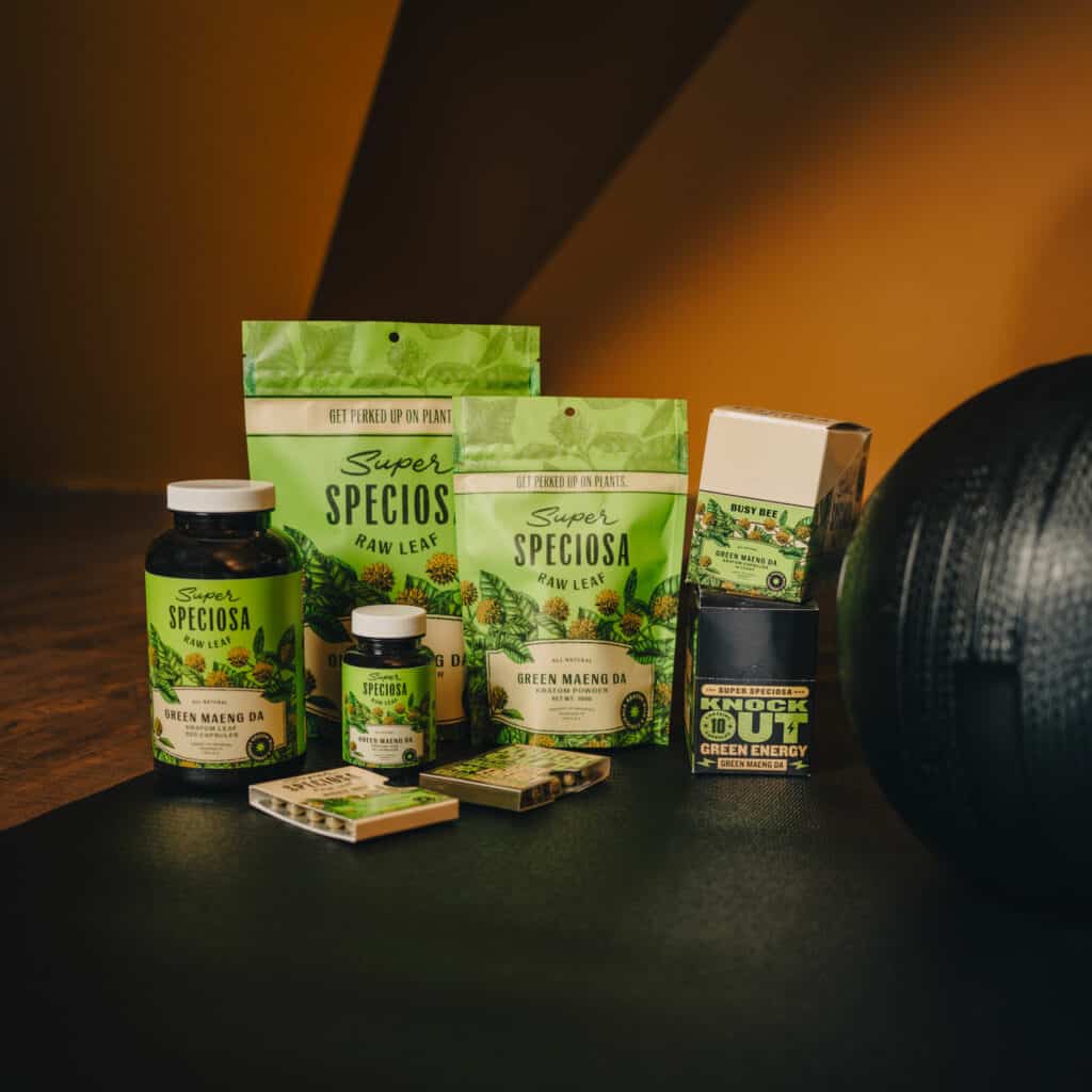 Super Speciosa's green vein kratom products showcased in gym.