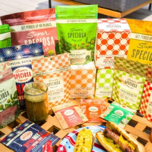 Super Speciosa's kratom products displayed at a summer bbq, perfect kratom selection for a kratom summer sale. Super Speciosa is the best place to buy kratom online.