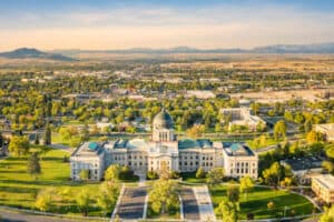 Drone view of the Montana State Capitol, in Helena, on a sunny afternoon with hazy sky caused by wildfires. The Montana State Capitol houses the Montana State Legislature. This is where an attempt on a kratom ban in Montana was made.