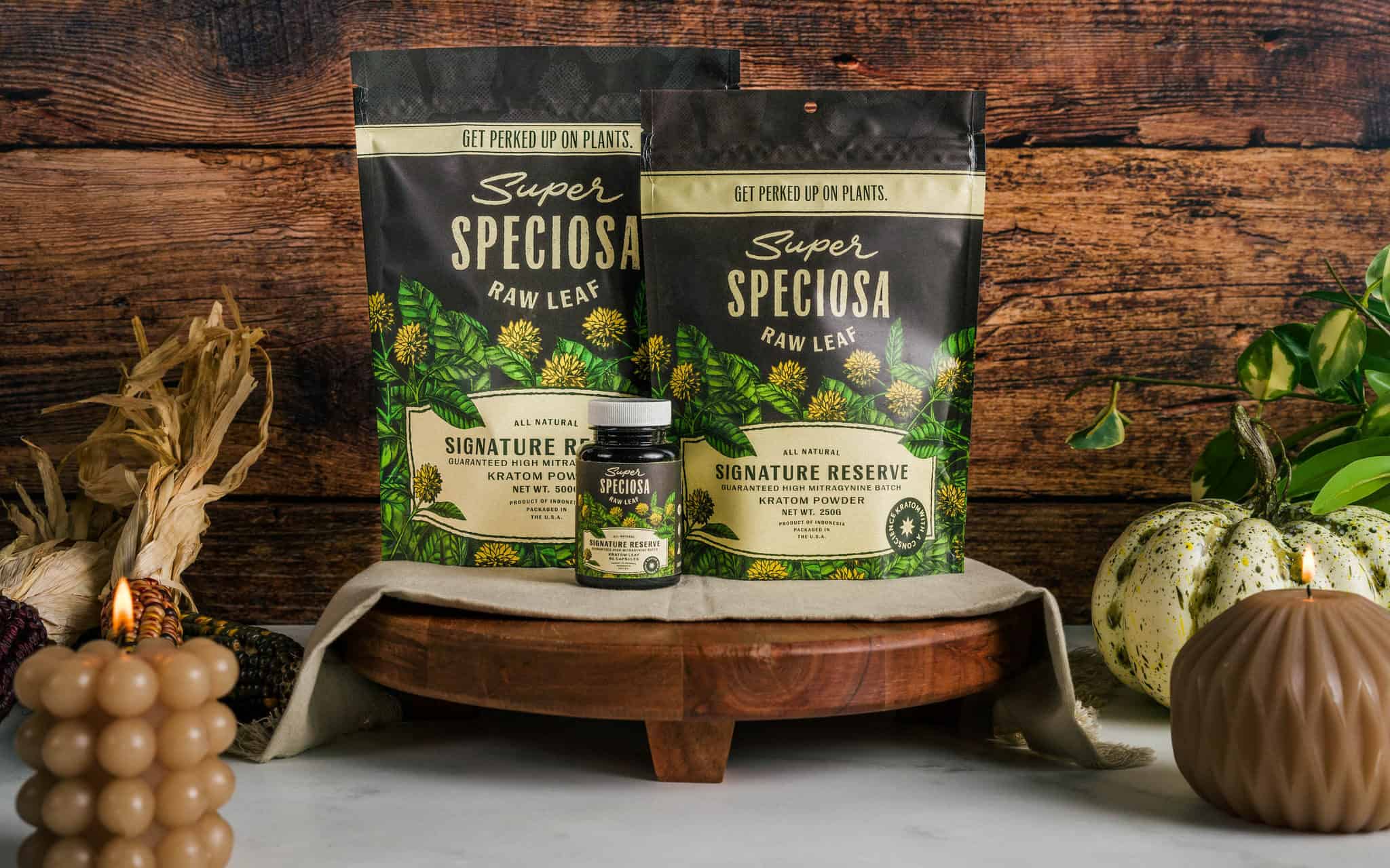 Super Speciosa's Signature Reserve green vein kratom strain stylized with a fall backdrop. Signature Reserve is one of the best kratom strains of 2023.