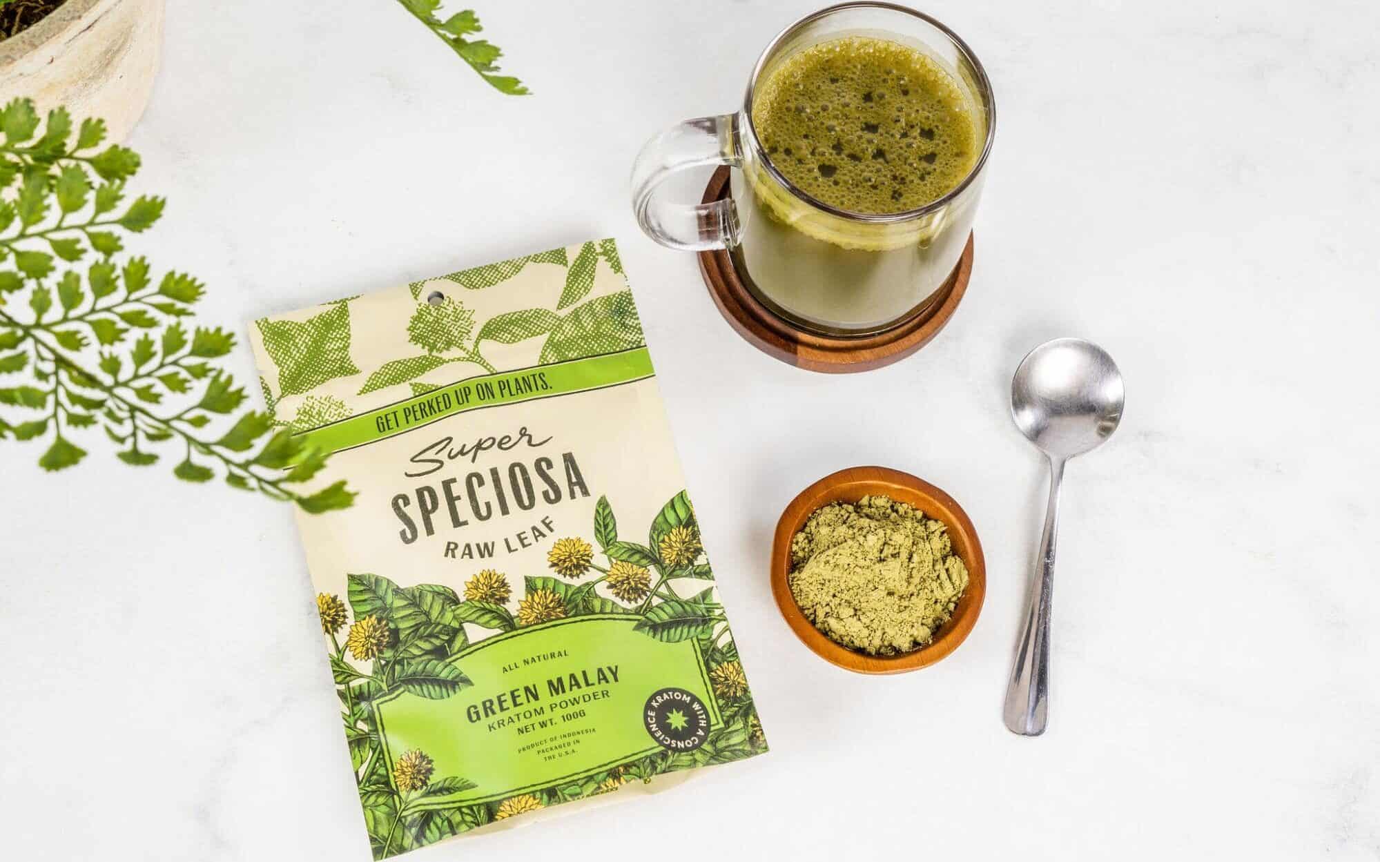 Super Speciosa’s Green Malay Kratom Strain with bowl of kratom powder and cup of kratom drink